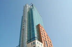 Vasteras Skyscraper Against Blue Sky Wallpaper