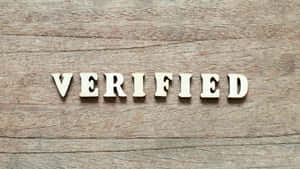 Verified Wordon Wooden Background Wallpaper