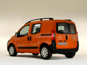 Versatile Fiat Fiorino Van On The Road Wallpaper