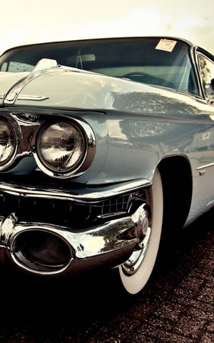 Vertical Vintage Blue Cadillac Wallpaper