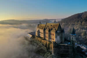 Vianden Castle Aerial View Misty Morning Wallpaper