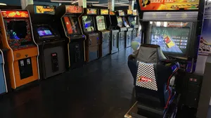 Vibrant Arcade Gaming Room Wallpaper