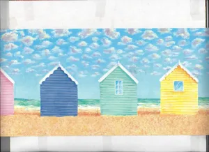Vibrant Beach Huts On Seashore Wallpaper
