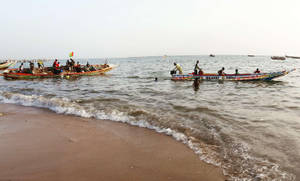 Vibrant Boats Adorned With The Senegal Flag Wallpaper