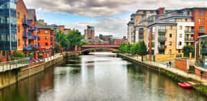 Vibrant, Daylight Shot Of Leeds Cityscape Wallpaper