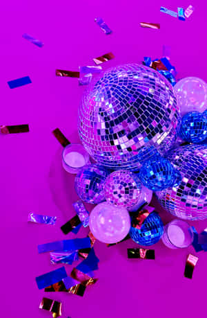 Vibrant Disco Ball Celebration Wallpaper