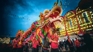 Vibrant Dragon Dance Celebration Wallpaper