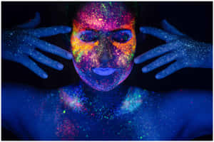 Vibrant Explosion Of Colors Under Black Light Wallpaper