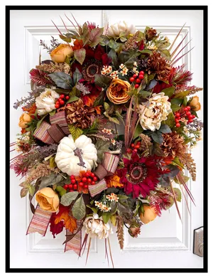 Vibrant Fall Wreath On A Rustic Wooden Door Wallpaper