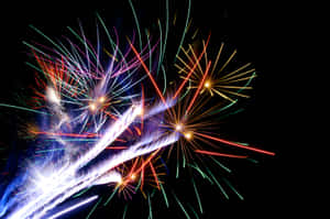 Vibrant Fireworks Display July Fourth Wallpaper