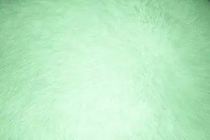 Vibrant Green Textured Background Wallpaper