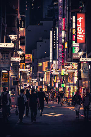 Vibrant Nightlife In The Bustling Night City Wallpaper