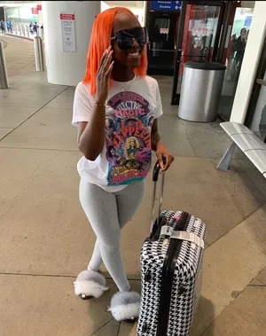 Vibrant Orange Hair Traveler Wallpaper