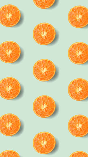 Vibrant Orange Slices Pattern Wallpaper