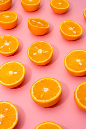 Vibrant Orangeson Pink Background Wallpaper