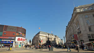 Vibrant Panoramic View Of Piccadilly Circus, London Wallpaper