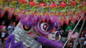 Vibrant Purple Lion Dance Wallpaper
