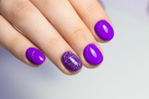 Vibrant Purple Manicurewith Accent Glitter Nail Wallpaper