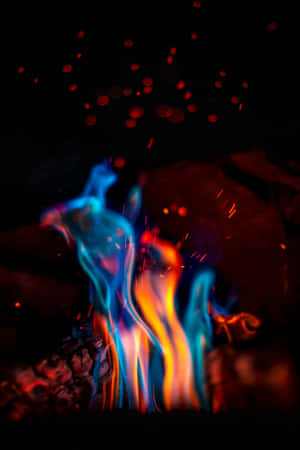Vibrant Red And Blue Fire Wallpaper