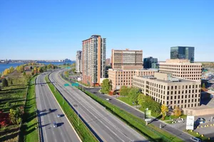 Vibrant Skyline Of Longueuil At Sunset Wallpaper
