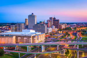 Vibrant Sunset Over Memphis Skyline Wallpaper