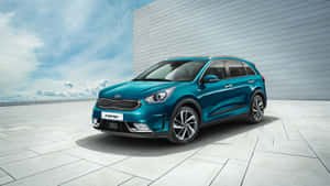 Vibrant Yellow Kia Niro On Urban Street Wallpaper