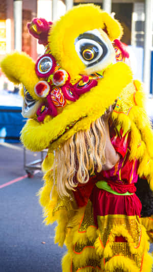 Vibrant Yellow Lion Dance Wallpaper