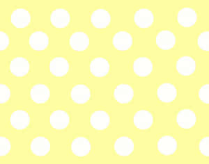 Vibrant Yellow Polka Dot Background Wallpaper