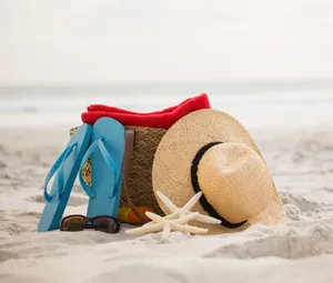 Vibrantly Colored Beach Accessories On A Sunny Day Wallpaper