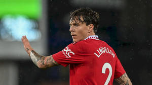 Victor Lindelof Manchester United Action Shot Wallpaper