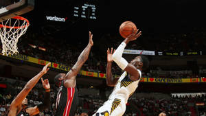 Victor Oladipo Jumping On The Court Wallpaper