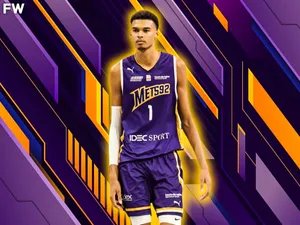 Victor Wembanyama In Action On The Basketball Court Wallpaper