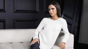 Victoria Beckham Elegant White Sweater Wallpaper