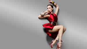 Victoria Beckham Red Dress Pose Wallpaper