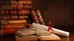 Victorian Era Booksand Glasses Wallpaper