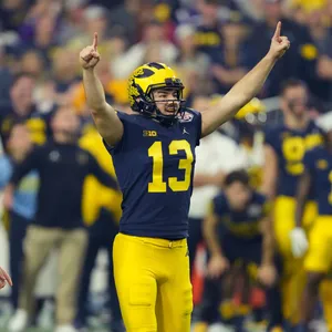 Victorious Football Player Celebration Wallpaper