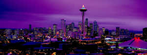 View Of The Beautiful Seattle Skyline At Sunset Wallpaper