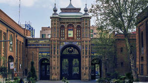 View Of The Traditional Bagh-e Melli In Tehran, Iran. Wallpaper