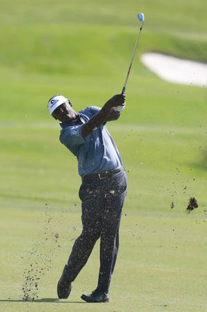 Vijay Singh Swinging Golf Club Portrait Wallpaper