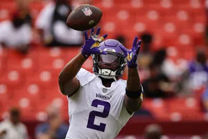 Vikings Player Catching Football Wallpaper