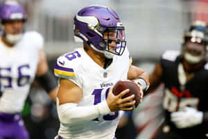 Vikings Quarterback Action Shot Wallpaper