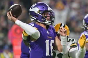 Vikings Quarterback Action Shot Wallpaper