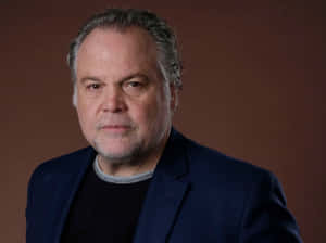 Vincent D'onofrio Strikes An Intense Pose In A Dark Suit Wallpaper