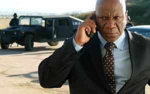 Ving Rhames Striking A Pose In A Stylish Outfit Wallpaper