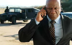 Ving Rhames Striking A Pose In A Stylish Outfit Wallpaper