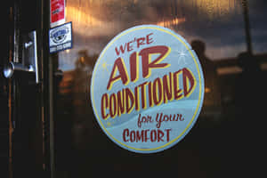 Vintage Air Conditioned Comfort Sign Wallpaper