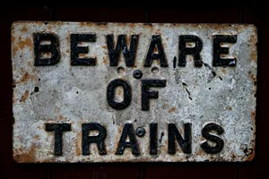 Vintage Bewareof Trains Sign Wallpaper
