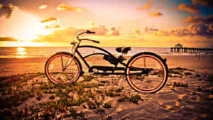 Vintage Bicycle Leaning Against A Rustic Wooden Fence Wallpaper