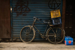 Vintage Bike At Storefront Wallpaper