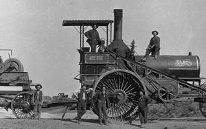 Vintage Black And White Photo Of People With Steam Tractor Wallpaper